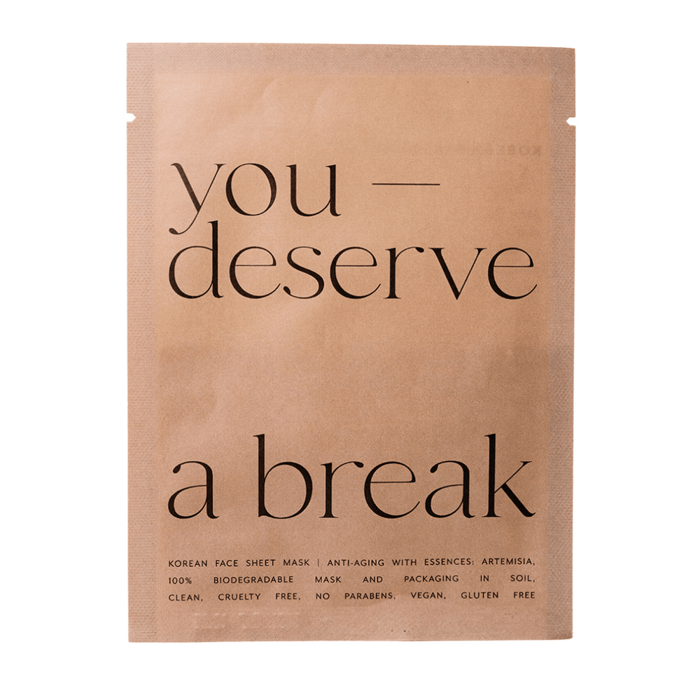 Korean Sheet Mask - You Deserve a Break | Lucky Owl packaging in natural brown with minimalist black text, promoting a biodegradable, vegan, cruelty-free skincare product for wellness and anti-aging.