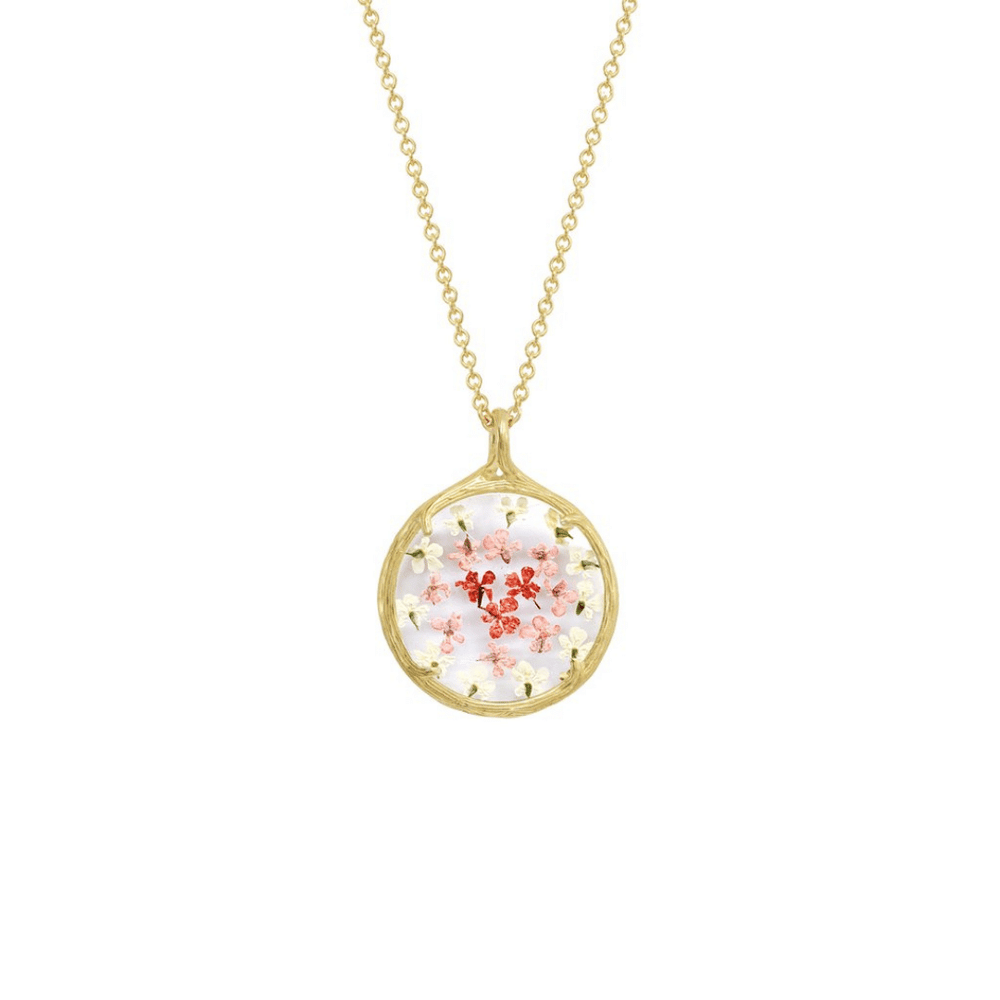 Small Ombre Botanical Necklace | Catherine Weitzman Jewelry features delicate pink and white flowers preserved in a round gold pendant on a fine gold chain.