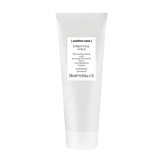White tube of Essential Scrub Professional | [ comfort zone ] with simple label highlighting illuminating refining exfoliating scrub for skincare and body care routines.