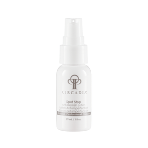 White pump bottle of Spot Stop (Professional) | Circadia anti-blemish lotion for skincare with minimalistic branding and 29 ml capacity.