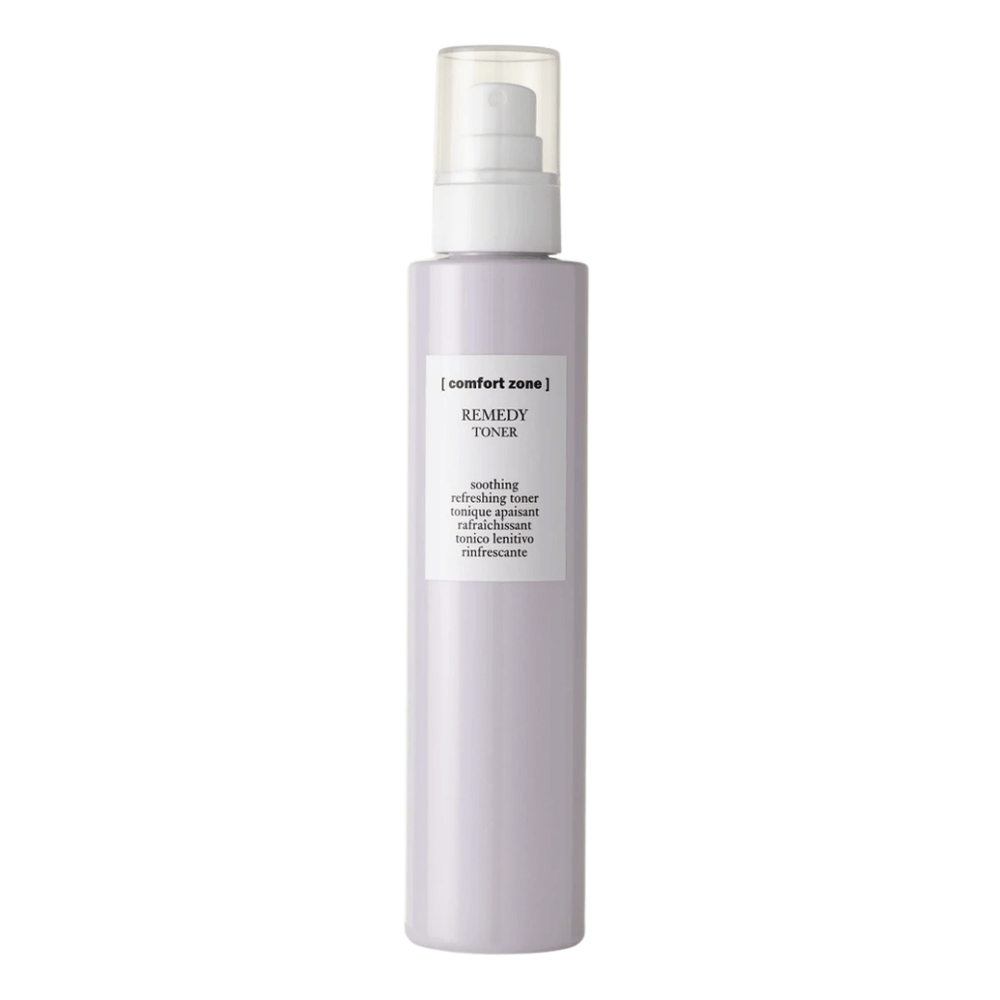 Bottle of Remedy Toner | [ comfort zone ] with a pale lavender color and a white pump dispenser, designed for soothing and refreshing skincare routines.