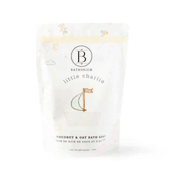 Packaging of little charlie™ Kids Bath Soak 750g | Bathorium featuring a soft pastel design with a sailboat illustration, promoting gentle skincare and body care for children.