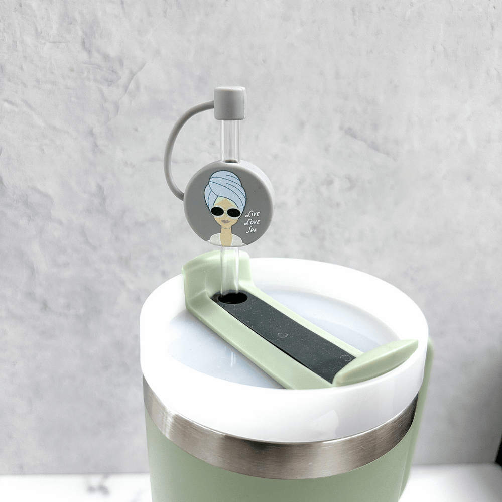 Spa Girl Straw Topper | Live Love Spa featuring a green straw topper with a round decoration of a spa girl wearing a towel and sunglasses, designed for wellness and body care cups.