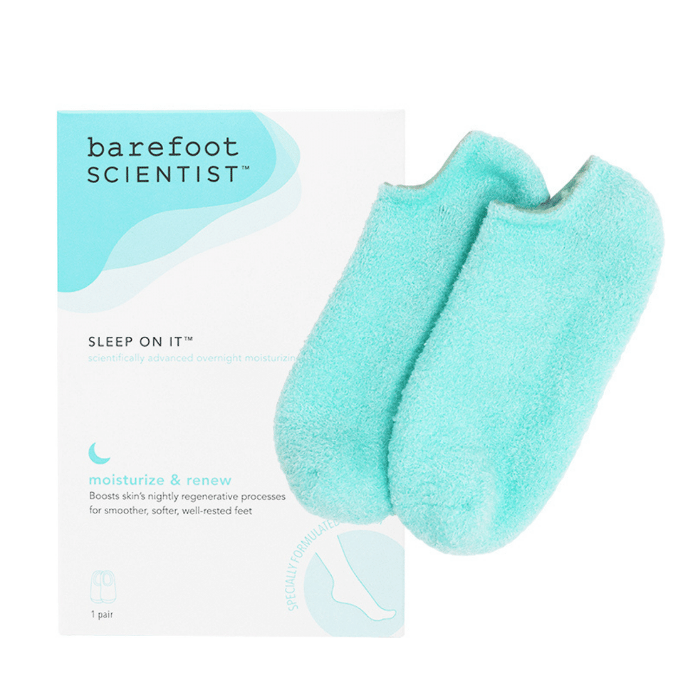 Pair of soft, turquoise gel moisturizing socks displayed next to the Sleep On It Overnight Moisturizing Gel Socks | Barefoot Scientist packaging designed for skincare and nighttime renewal.