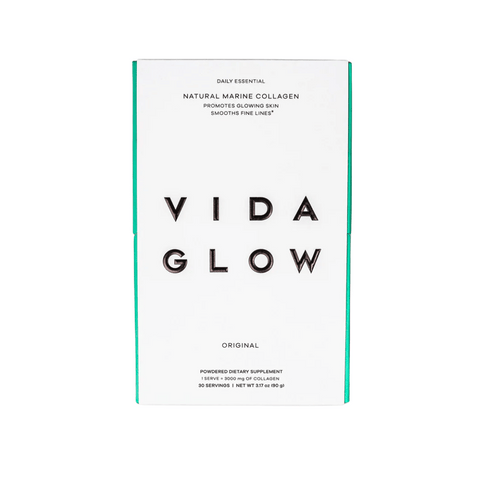 White and teal packaging of Natural Marine Collagen | VIDA GLOW, a powdered dietary supplement promoting glowing skin and smoothing fine lines for skincare and wellness.