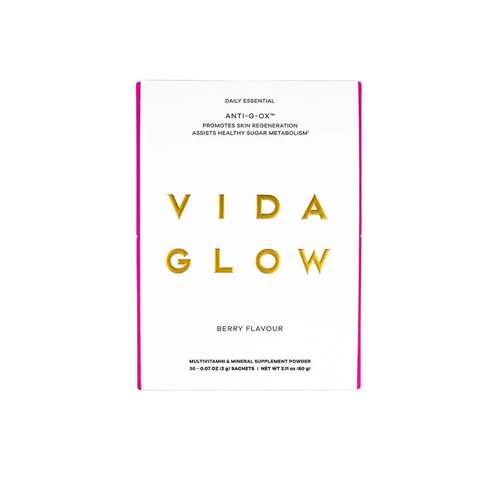 White and pink box packaging of Anti-G-Ox Berry | VIDA GLOW multivitamin and mineral supplement powder promoting skin regeneration and healthy sugar metabolism.