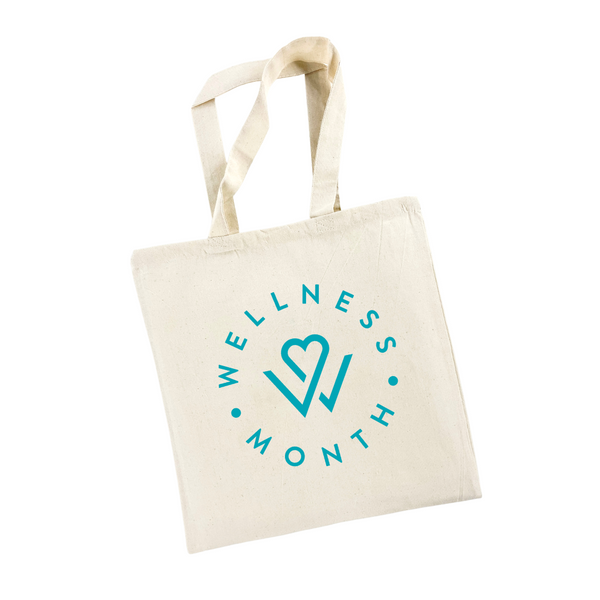 Canvas tote bag with teal Wellness Month logo and heart design, promoting self-care and wellness, labeled as Wellness Month Tote - Teal | Wellness Month.