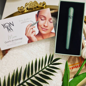 My Massage Crystal - Aventurine Crystal Massage Wands | Yon-Ka Paris displayed with a promotional card featuring a woman using the wand for skincare facial massage on a white towel with greenery accents.