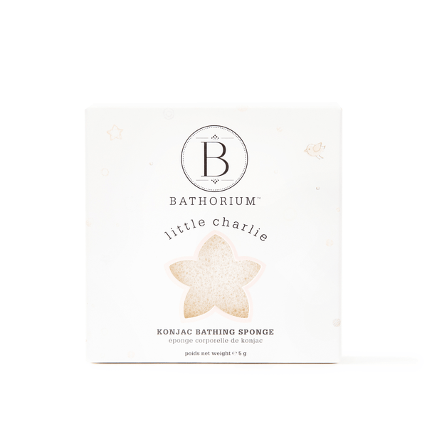 Packaging of little charlie™ Konjac Sponge | Bathorium showing a white box with star-shaped cutout revealing natural konjac bathing sponge inside, designed for gentle skincare and body care.