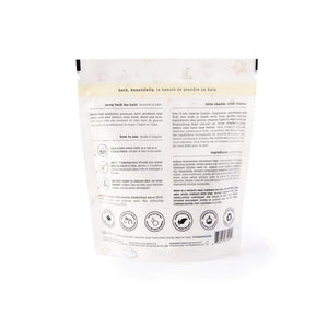 Back view of little charlie™ Kids Bath Soak 750g | Bathorium packaging showing usage instructions, ingredients, and product benefits for a gentle kids bath soak promoting wellness and skin care.