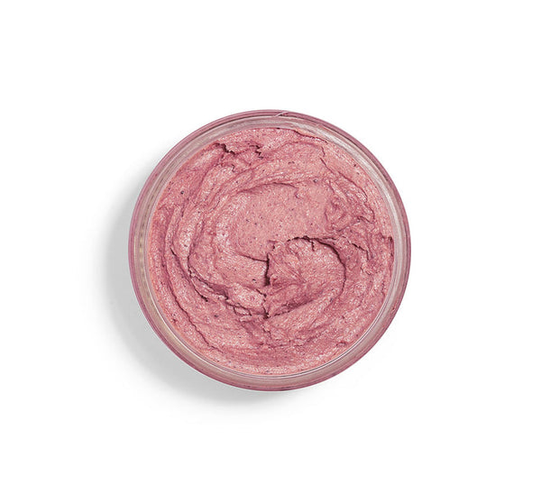 Top view of a jar containing a creamy pink skincare product, Illumination Fruit Professional Strength Brightening Fruit Acid Peel Mask | Farmhouse Fresh, designed for brightening and exfoliating skin.