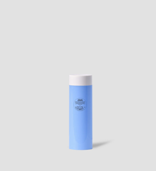 Blue cylindrical bottle with a white cap containing Hydramemory Water Source Serum | [ comfort zone ], a skincare product designed for hydration and wellness.