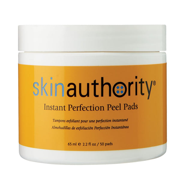 Jar of Instant Perfection Peel Pads | Skin Authority with a white lid and bright orange label, designed for skincare exfoliation and skin renewal.