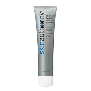 Tube of Tri-Power Peptide Hydrator | Skin Authority skincare product with gray packaging and blue and black text, designed for moisturizing and revitalizing skin.