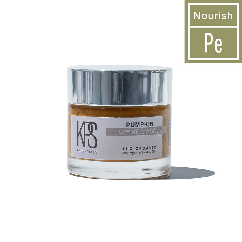 Jar of Pumpkin Enzyme Mask | Kindness Powered Skincare with silver lid and natural orange product inside, promoting skincare and nourishment.