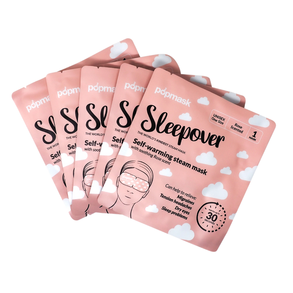 Six pink packets of Sleepover Self Warming Steam Mask | Popmask displayed fanned out, featuring white cloud designs and product details on each pouch.