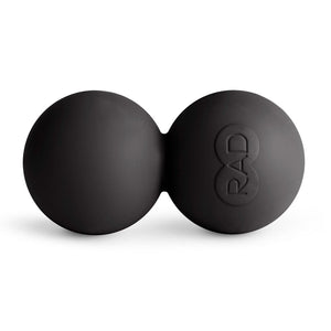Black double lacrosse massage ball with a smooth matte finish and the embossed RAD logo, designed for targeted muscle recovery and myofascial release, RAD Roller Stiff | RAD.