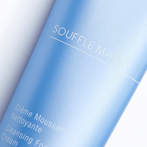 Close-up of a blue tube of Souffle Marin Cleansing Foaming Cream | Phytomer showing the minimalist skincare packaging for a gentle cleansing foam product.