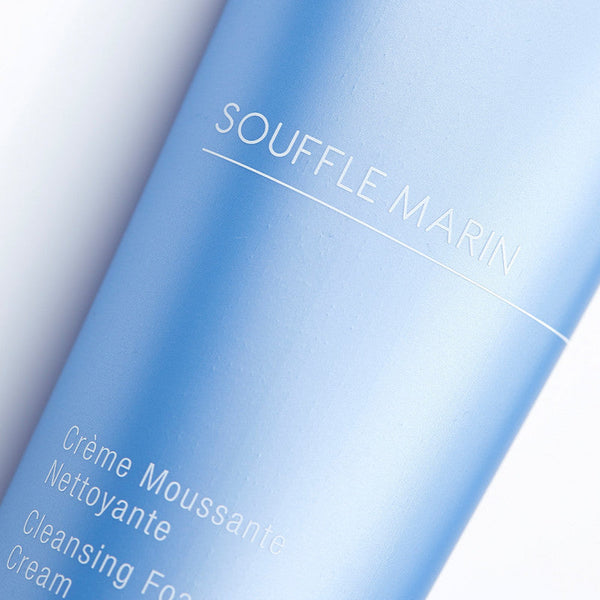 Close-up of a blue tube of Souffle Marin Cleansing Foaming Cream | Phytomer showing the minimalist skincare packaging for a gentle cleansing foam product.