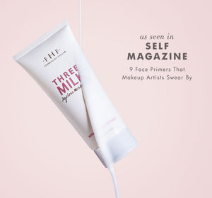 Silky, Milky & Most Loved Naked Nourishment Set | Farmhouse Fresh tube with creamy white lotion flowing against a soft pink background, promoting skincare and body care.