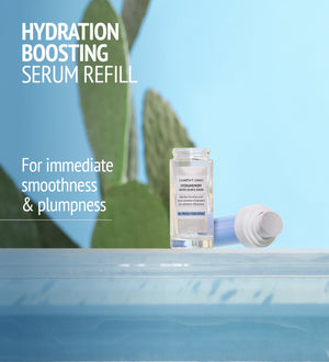 Hydramemory Water Source Serum | [ comfort zone ] hydration boosting skincare serum refill bottle with blue cap beside it, promoting immediate smoothness and plumpness.