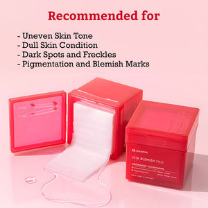 Red container of Vita Blemish Pad | Leaders with an open lid showing moist pads inside, recommended for uneven skin tone, dull skin, dark spots, freckles, pigmentation, and blemish marks.