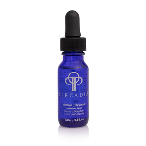 Blue glass dropper bottle of Vitamin C Reversal Serum (Professional) | Circadia antioxidant skincare product for skin health and wellness.